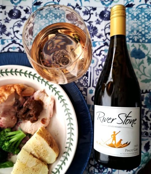 River Stone Winery bottle with plate of food