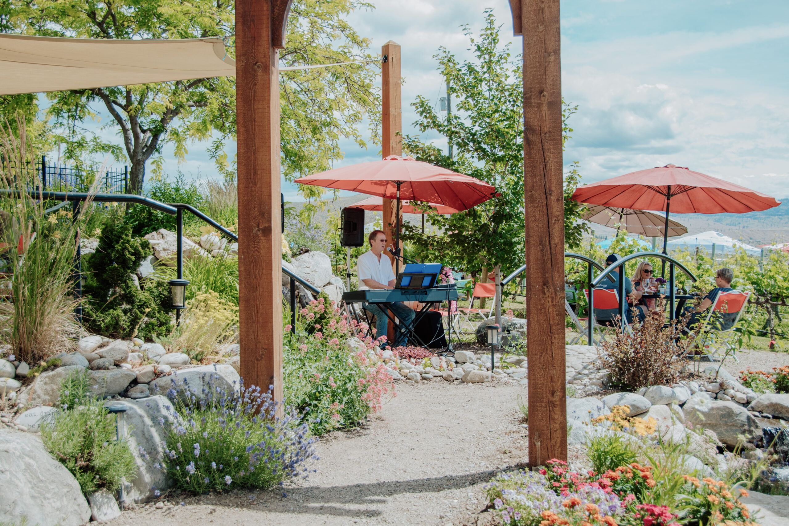 Live Music by Bernie in the River Stone Tasting Garden